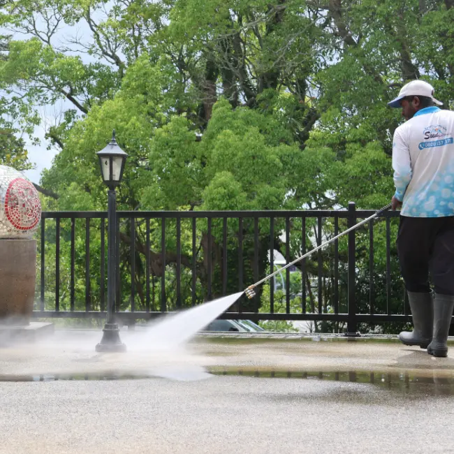 a man doing Water-blasting